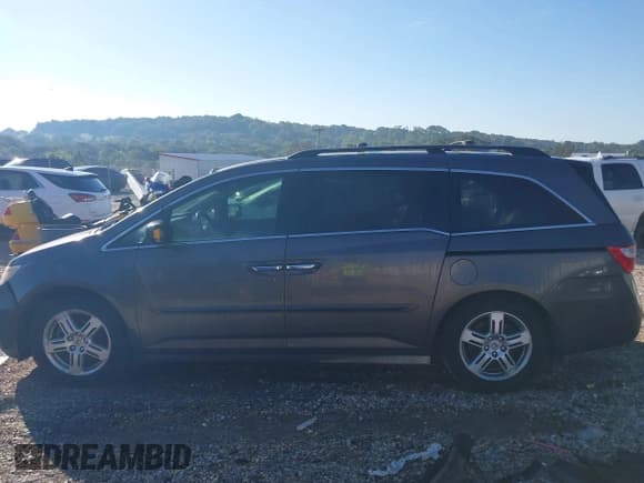 ✅ 2012 Honda Odyssey Touring • VIN: 5FNRL5H94CB038755 • Lot: 43294943. Wystawiony na IAAI z przebiegiem 219 448 mil. Bezpłatny archiwum sprzedaży aukcyjnych z USA i szczegółowy raport historii pojazdu na DreamBid. Zdjęcie 15.