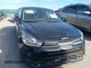 ✅ 2023 Kia Rio S • VIN: 3KPA24AD5PE525239 • Lot: 43356786. Listed on IAAI with 56,144 mi. Free auction sales archive from the USA and detailed vehicle history report at DreamBid. Image 12.