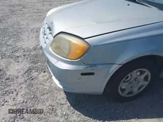 2004 Hyundai Accent GL z VIN KMHCG45C34U499258, wystawiony jako IAAI lot #43220179 z przebiegiem 164 871 mil mil oraz . Historia ofert i sprzedaży dostępna na DreamBid. Obrazek 6.