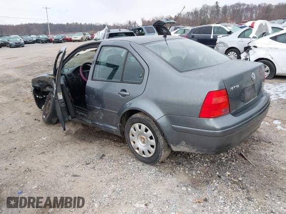 ✅ 2003 Volkswagen Jetta GL • VIN: 3VWRK69M03M159898 • Lot: 41474530. Listed on IAAI with 237,485 mi. Free auction sales archive from the USA and detailed vehicle history report at DreamBid. Image 3.