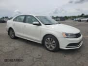 ✅ 2015 Volkswagen Jetta SE • VIN: 3VWD17AJ2FM255590 • Lot: 58287585. Listed on Copart with 124,640 mi. Free auction sales archive from the USA and detailed vehicle history report at DreamBid. Image 4.