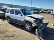 ✅ 2005 Mazda Tribute S • VIN: 4F2CZ96105KM05245 • Lot: 70380505. Listed on Copart with 193,767 mi. Free auction sales archive from the USA and detailed vehicle history report at DreamBid. Image 4.