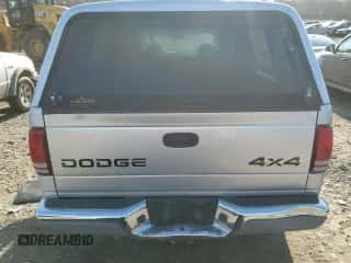 2001 Dodge Dakota Sport z VIN 1B7HG2AXX1S251376, wystawiony jako Copart lot #77015144 z przebiegiem 163 751 mil mil oraz Szkoda całkowita • Salvage title. Historia ofert i sprzedaży dostępna na DreamBid. Obrazek 6.