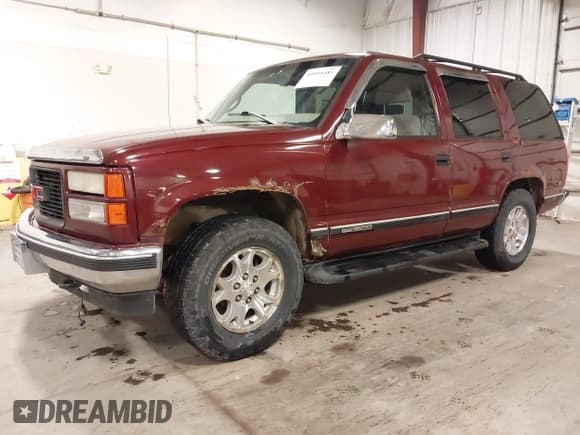 ✅ 1999 GMC Yukon • VIN: 1GKEK13R3XJ700930 • Lot: 40915481. Wystawiony na IAAI z przebiegiem 249 773 mil. Bezpłatny archiwum sprzedaży aukcyjnych z USA i szczegółowy raport historii pojazdu na DreamBid. Zdjęcie 20.