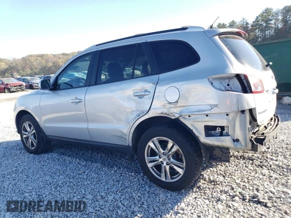 ✅ 2012 Hyundai Santa Fe SE • VIN: 5XYZHDAG2CG145428 • Lot: 81672604. Listed on Copart with 89,987 mi. Free auction sales archive from the USA and detailed vehicle history report at DreamBid. Image 2.