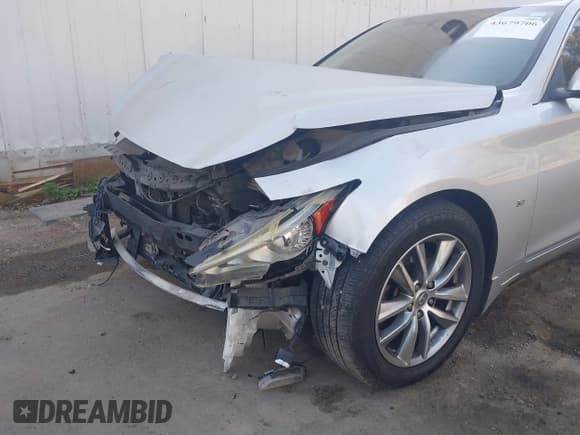 ✅ 2014 Infiniti Q50 Premium • VIN: JN1BV7AP7EM679489 • Lot: 43679706. Wystawiony na IAAI z przebiegiem 153 839 mil. Bezpłatny archiwum sprzedaży aukcyjnych z USA i szczegółowy raport historii pojazdu na DreamBid. Zdjęcie 6.