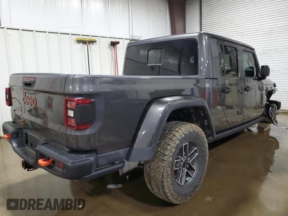 ✅ 2024 Jeep Gladiator Mojave X • VIN: 1C6JJTEG2RL106980 • Lot: 55142885. Listed on Copart with 7,263 mi. Free auction sales archive from the USA and detailed vehicle history report at DreamBid. Image 3.