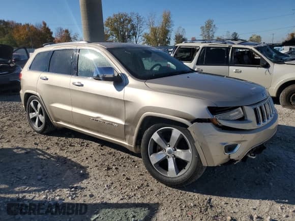✅ 2014 Jeep Grand Cherokee Overland • VIN: 1C4RJFCT9EC147999 • Lot: 89689645. Listed on Copart with 133,640 mi. Free auction sales archive from the USA and detailed vehicle history report at DreamBid. Image 4.
