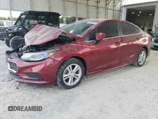 ✅ 2017 Chevrolet Cruze LT • VIN: 1G1BE5SM1H7146782 • Lot: 82328735. Listed on Copart with 44,576 mi. Free auction sales archive from the USA and detailed vehicle history report at DreamBid. Image 1.
