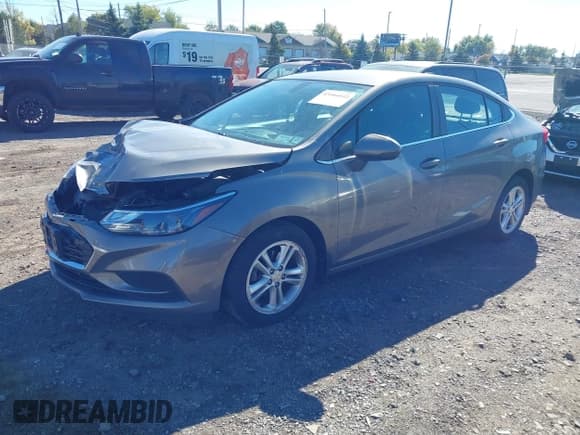 ✅ 2018 Chevrolet Cruze LT • VIN: 1G1BE5SM3J7226199 • Lot: 43466842. Listed on IAAI with 67,601 mi. Free auction sales archive from the USA and detailed vehicle history report at DreamBid. Image 2.