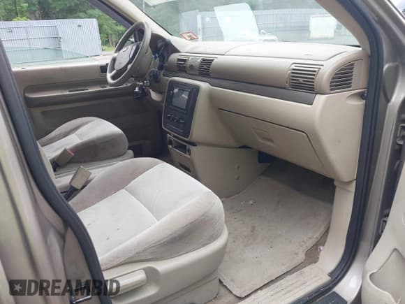 ✅ 2004 Ford Freestar SES • VIN: 2FMZA57684BA11355 • Лот: 42589189. Опубликован ранее на IAAI с пробегом 121 000 миль. Бесплатный доступ к архиву аукционных продаж из США и подробный отчёт об истории автомобиля на DreamBid. Изображение 5.