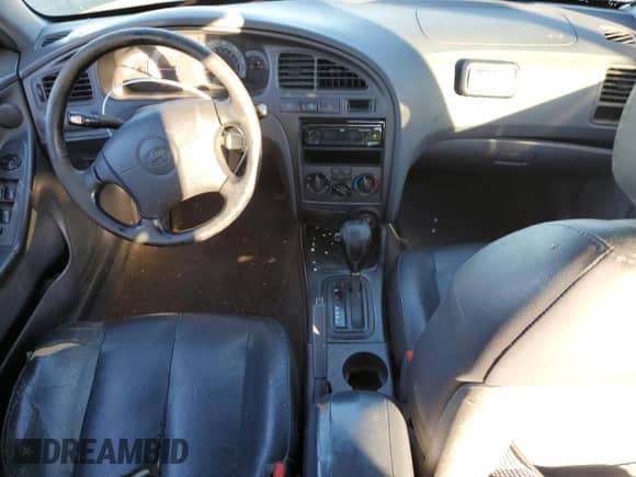 2002 Hyundai Elantra GT z VIN KMHDN55D22U037795, wystawiony jako Copart lot #44351255 z przebiegiem 294 604 mil mil oraz Szkoda całkowita • Salvage title. Historia ofert i sprzedaży dostępna na DreamBid. Obrazek 8.