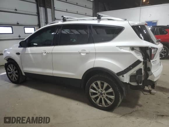 2017 Ford Escape Titanium с VIN 1FMCU9J96HUC05437, выставлен на аукционе Copart как лот 80256605 с пробегом 175 408 миль миль и Списание • Salvage title. История ставок и продаж доступна на DreamBid. Изображение 2.