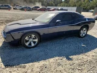2016 Dodge Challenger SXT z VIN 2C3CDZAG6GH285122, wystawiony jako Copart lot #89642175 z przebiegiem 165 147 mil mil oraz Szkoda całkowita • Salvage title. Historia ofert i sprzedaży dostępna na DreamBid. Obrazek 1.
