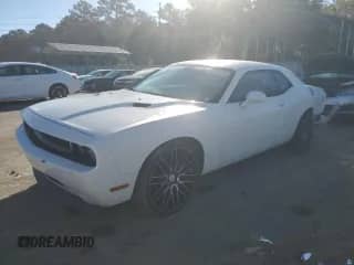 2014 Dodge Challenger SXT with VIN 2C3CDYAG4EH244947, listed as a Copart auction lot 91203745 with 195,607 mi miles and Salvage title. Bid and sale history available at DreamBid. Image 1.