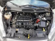 ✅ 2014 Ford Fiesta SE • VIN: 3FADP4EJ4EM166201 • Lot: 80356895. Wystawiony na Copart z przebiegiem 166 831 mil. Bezpłatny archiwum sprzedaży aukcyjnych z USA i szczegółowy raport historii pojazdu na DreamBid. Zdjęcie 11.