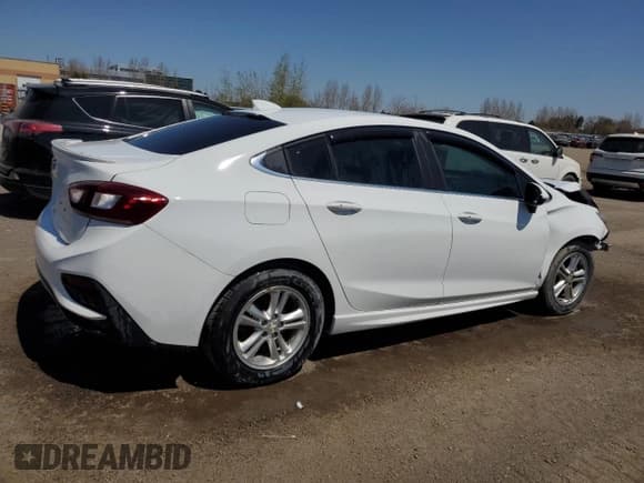 ✅ 2017 Chevrolet Cruze LT • VIN: 1G1BE5SM9H7104649 • Lot: 56316975. Listed on Copart with 117,842 mi. Free auction sales archive from the USA and detailed vehicle history report at DreamBid. Image 3.