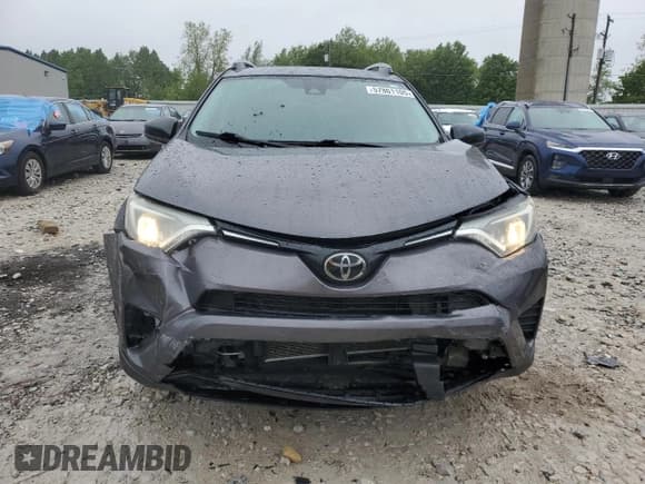 ✅ 2017 Toyota RAV4 LE • VIN: 2T3BFREV2HW564465 • Lot: 57801105. Listed on Copart with 96,531 mi. Free auction sales archive from the USA and detailed vehicle history report at DreamBid. Image 5.