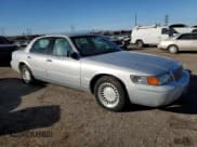 ✅ 2002 Mercury Grand Marquis LS Premium • VIN: 2MEFM75W22X623854 • Lot: 89924855. Listed on Copart with 145,494 mi. Free auction sales archive from the USA and detailed vehicle history report at DreamBid. Image 4.