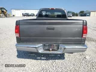 2001 Dodge Dakota Sport с VIN 1B7GG22N71S336152, выставлен на аукционе Copart как лот 70697244 с пробегом 256 693 миль миль и Списание • Salvage title. История ставок и продаж доступна на DreamBid. Изображение 6.