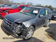 ✅ 2009 Ford Escape XLS • VIN: 1FMCU027X9KD07605 • Lot: 41849188. Wystawiony na IAAI z przebiegiem 166 363 mil. Bezpłatny archiwum sprzedaży aukcyjnych z USA i szczegółowy raport historii pojazdu na DreamBid. Zdjęcie 2.