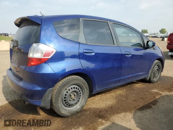✅ 2013 Honda Fit • VIN: LUCGE8G51D3004753 • Lot: 69306175. Listed on Copart with 502,698 mi. Free auction sales archive from the USA and detailed vehicle history report at DreamBid. Image 3.