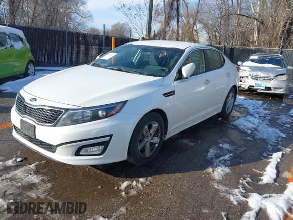 ✅ 2015 Kia Optima LX • VIN: KNAGM4A73F5560416 • Lot: 43843522. Listed on IAAI with 122,365 mi. Free auction sales archive from the USA and detailed vehicle history report at DreamBid. Image 2.