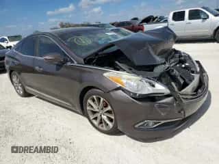 2015 Hyundai Azera z VIN KMHFG4JG2FA490660, wystawiony jako Copart lot #77157344 z przebiegiem Nie podano mil oraz Szkoda całkowita • Salvage title. Historia ofert i sprzedaży dostępna na DreamBid. Obrazek 4.