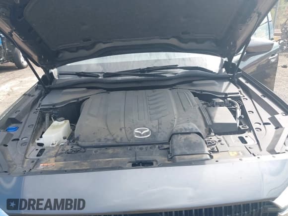 ✅ 2024 Mazda CX-90 Premium • VIN: JM3KKDHD1R1142308 • Lot: 43282823. Listed on IAAI with 49,680 mi. Free auction sales archive from the USA and detailed vehicle history report at DreamBid. Image 10.