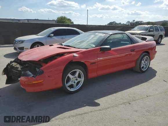 1997 Chevrolet Camaro Z28 z VIN 2G1FP22P3V2125956, wystawiony jako Copart lot #49401315 z przebiegiem 179 140 mil mil oraz Szkoda całkowita • Salvage title. Historia ofert i sprzedaży dostępna na DreamBid. Obrazek 1.