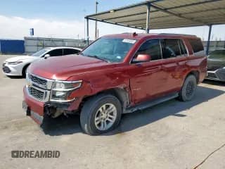 2017 Chevrolet Tahoe LS with VIN 1GNSCAKC1HR243456, listed as a Copart auction lot 67948855 with 136,173 mi miles and Salvage title. Bid and sale history available at DreamBid. Image 1.