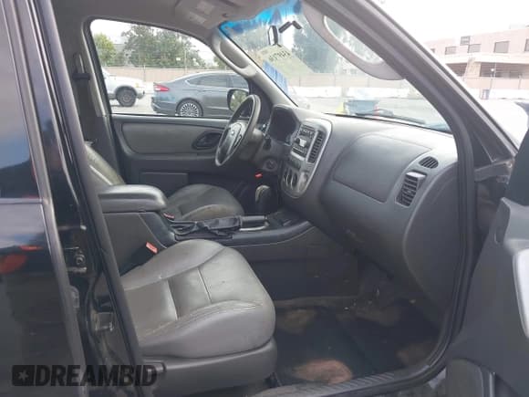 ✅ 2007 Ford Escape Hybrid • VIN: 1FMCU59H77KB28379 • Lot: 43497136. Listed on IAAI with 322,847 mi. Free auction sales archive from the USA and detailed vehicle history report at DreamBid. Image 5.