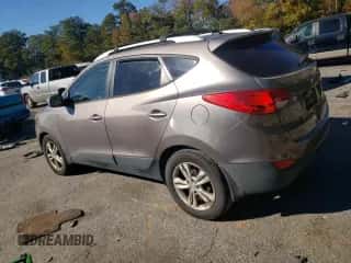 2013 Hyundai Tucson GLS z VIN KM8JU3AC9DU612128, wystawiony jako Copart lot #91513955 z przebiegiem 266 616 mil mil oraz Czysty tytuł • Clean title. Historia ofert i sprzedaży dostępna na DreamBid. Obrazek 2.