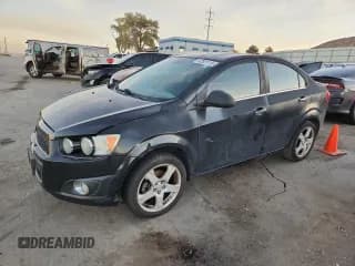 ✅ 2013 Chevrolet Sonic LTZ • VIN: 1G1JE5SH6D4210583 • Lot: 92501115. Listed on Copart with 127,685 mi. Free auction sales archive from the USA and detailed vehicle history report at DreamBid. Image 1.