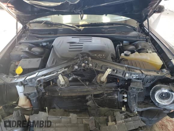 2018 Dodge Challenger SXT z VIN 2C3CDZAG0JH236229, wystawiony jako Copart lot #84886725 z przebiegiem 73 576 mil mil oraz Szkoda całkowita • Salvage title. Historia ofert i sprzedaży dostępna na DreamBid. Obrazek 11.