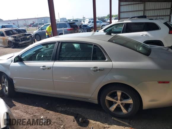 2012 Chevrolet Malibu 1LT z VIN 1G1ZC5EU4CF397391, wystawiony jako IAAI lot #42925839 z przebiegiem 70 327 mil mil oraz . Historia ofert i sprzedaży dostępna na DreamBid. Obrazek 14.