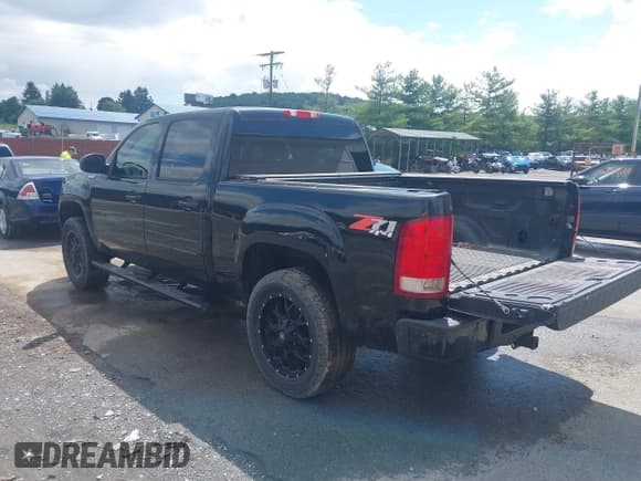 ✅ 2011 GMC Sierra 1500 SLT • VIN: 3GTP2WE34BG283175 • Лот: 42681744. Опубликован ранее на IAAI с пробегом 124 863 миль. Бесплатный доступ к архиву аукционных продаж из США и подробный отчёт об истории автомобиля на DreamBid. Изображение 3.