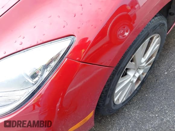 ✅ 2009 Mazda 6 i Grand Touring • VIN: 1YVHP82AX95M33869 • Lot: 41709478. Listed on IAAI with 163,682 mi. Free auction sales archive from the USA and detailed vehicle history report at DreamBid. Image 12.