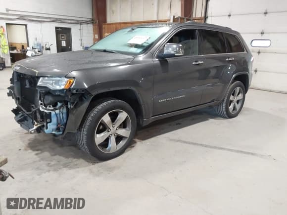 ✅ 2014 Jeep Grand Cherokee Overland • VIN: 1C4RJFCGXEC340052 • Lot: 43485667. Listed on IAAI with 113,840 mi. Free auction sales archive from the USA and detailed vehicle history report at DreamBid. Image 2.