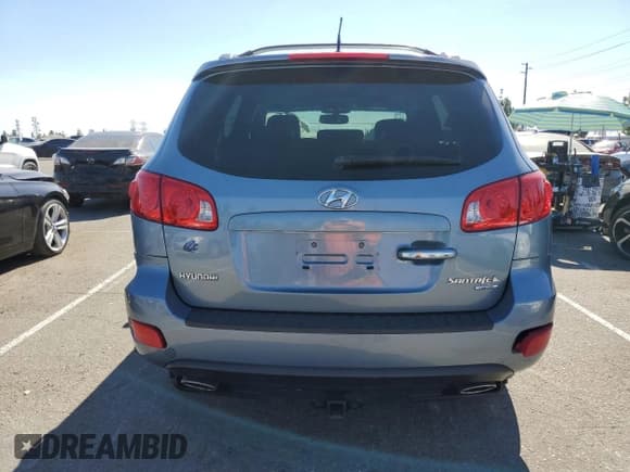 ✅ 2009 Hyundai Santa Fe Limited • VIN: 5NMSH13E59H254816 • Lot: 77625744. Listed on Copart with 91,543 mi. Free auction sales archive from the USA and detailed vehicle history report at DreamBid. Image 6.