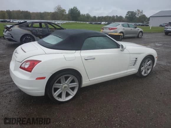 ✅ 2005 Chrysler Crossfire Limited • VIN: 1C3AN65L75X056564 • Lot: 76039594. Listed on Copart with 68,256 mi. Free auction sales archive from the USA and detailed vehicle history report at DreamBid. Image 3.