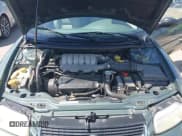 ✅ 1997 Chrysler Sebring JXi • VIN: 3C3EL55H9VT593610 • Lot: 42130218. Listed on IAAI with 171,578 mi. Free auction sales archive from the USA and detailed vehicle history report at DreamBid. Image 10.