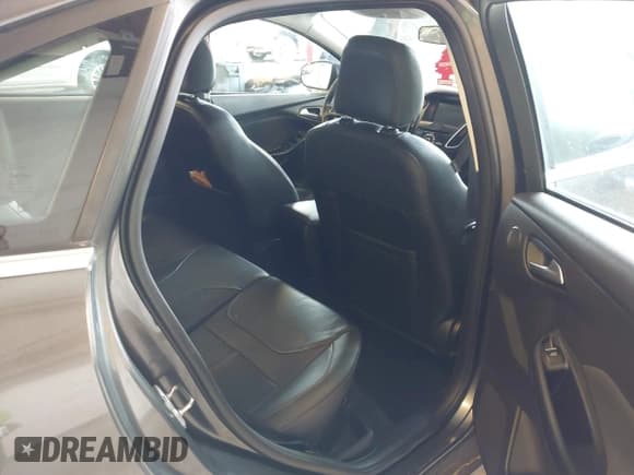 ✅ 2015 Ford Focus Titanium • VIN: 1FADP3J22FL260718 • Lot: 42545411. Listed on IAAI with 83,518 mi. Free auction sales archive from the USA and detailed vehicle history report at DreamBid. Image 8.