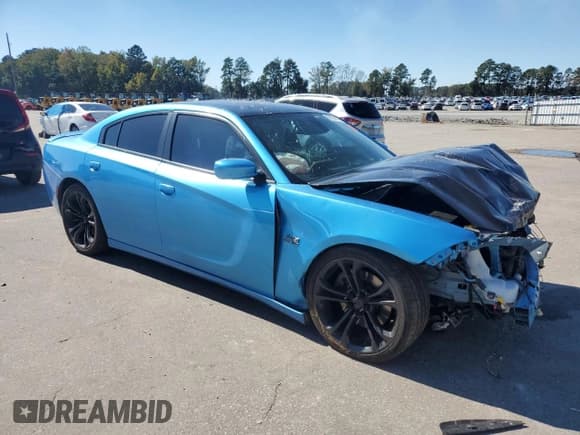 ✅ 2015 Dodge Charger RT • VIN: 2C3CDXCT2FH841049 • Lot: 86120715. Listed on Copart with 76,323 mi. Free auction sales archive from the USA and detailed vehicle history report at DreamBid. Image 4.
