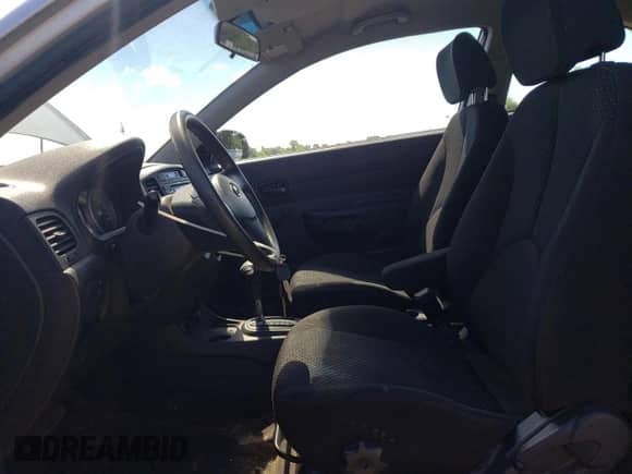 2010 Hyundai Accent L with VIN KMHCN3BCXAU182917, listed as a Copart auction lot 69464685 with 124,678 mi miles and Salvage title. Bid and sale history available at DreamBid. Image 7.