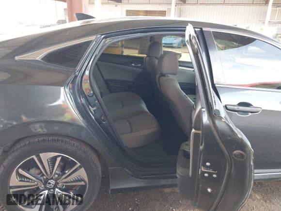 ✅ 2018 Honda Civic EX-T • VIN: JHMFC1F35JX021667 • Lot: 43778970. Listed on IAAI with 159,063 mi. Free auction sales archive from the USA and detailed vehicle history report at DreamBid. Image 8.