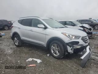 ✅ 2018 Hyundai Santa Fe 2.4L • VIN: 5XYZUDLB8JG508051 • Лот: 39511374. Опубликован ранее на Copart с пробегом 82 295 миль. Бесплатный доступ к архиву аукционных продаж из США и подробный отчёт об истории автомобиля на DreamBid. Изображение 4.