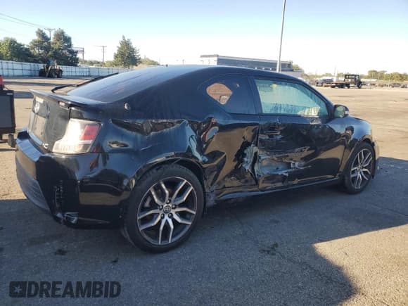 ✅ 2016 Scion tC • VIN: JTKJF5C79GJ014436 • Lot: 86107315. Listed on Copart with 115,686 mi. Free auction sales archive from the USA and detailed vehicle history report at DreamBid. Image 3.