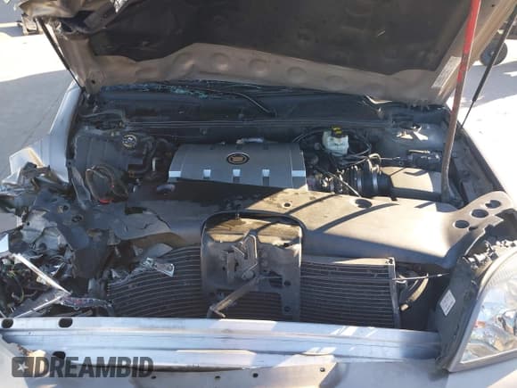 ✅ 2004 Cadillac DeVille DHS • VIN: 1G6KE57Y34U138359 • Lot: 43535083. Listed on IAAI with 84,329 mi. Free auction sales archive from the USA and detailed vehicle history report at DreamBid. Image 10.