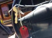 ✅ 1994 Lincoln Town Car Executive • VIN: 1LNLM81W3RY701094 • Lot: 42385800. Wystawiony na IAAI z przebiegiem 135 669 mil. Bezpłatny archiwum sprzedaży aukcyjnych z USA i szczegółowy raport historii pojazdu na DreamBid. Zdjęcie 11.